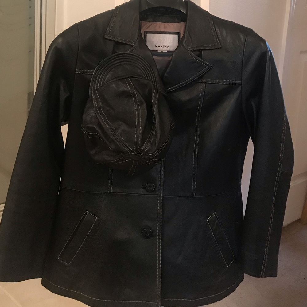 Women’s black leather jacket with leather hat